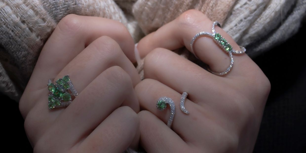 Afoite JARDIN mangrove, snake, and middle vine rings with Prosperity Earth mined demantoid gems.