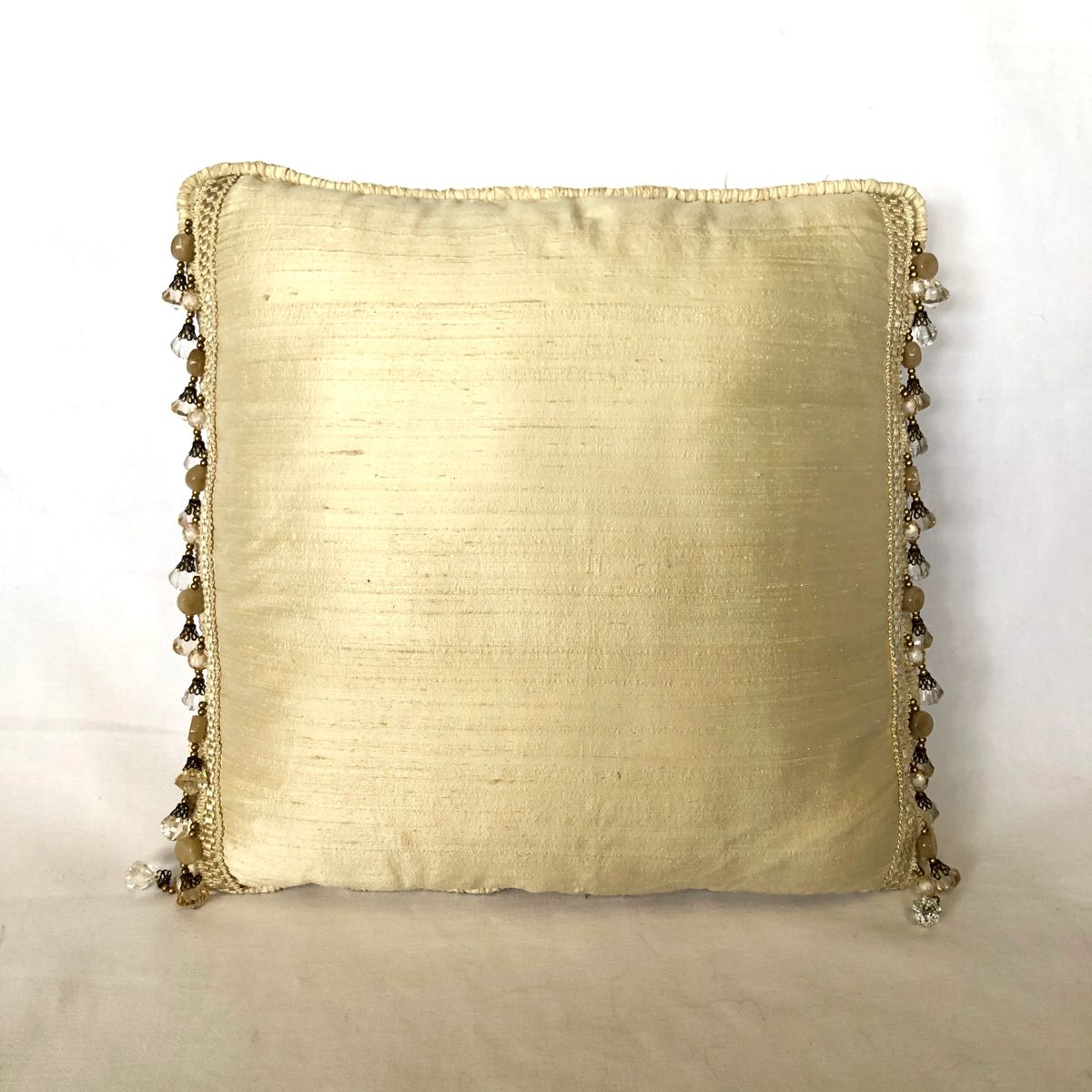 Gold Pillow with beaded trim