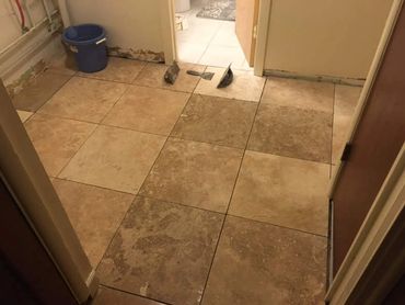 Finished ceramic tile flooring 