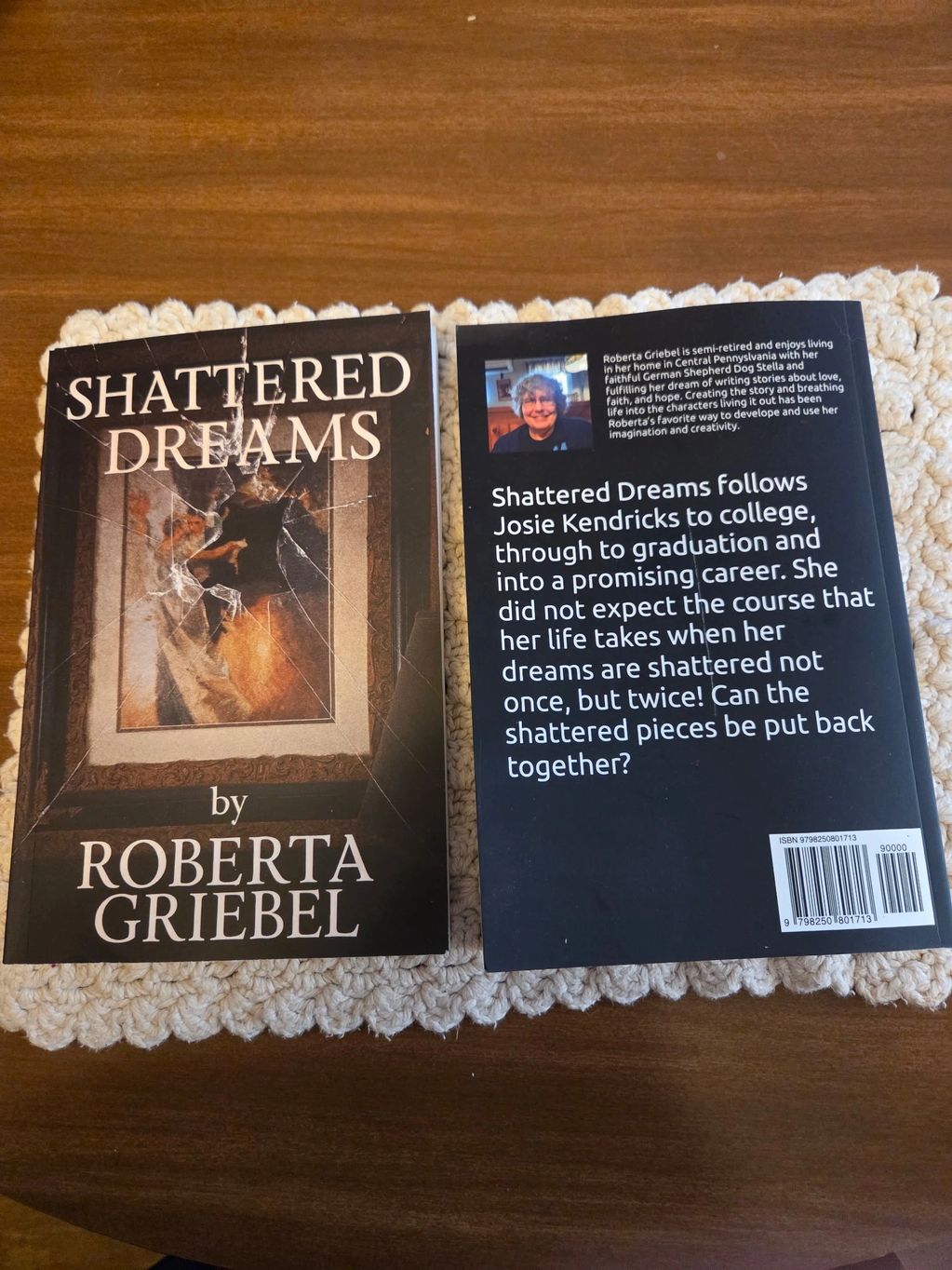Book "Shattered Dreams" by Roberta Griebel with a cracked glass cover.