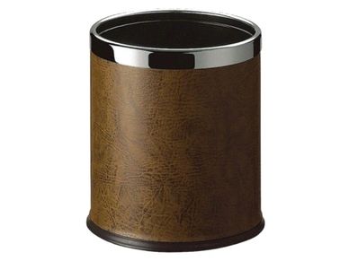 Brown leather wastebasket with chrome rim.