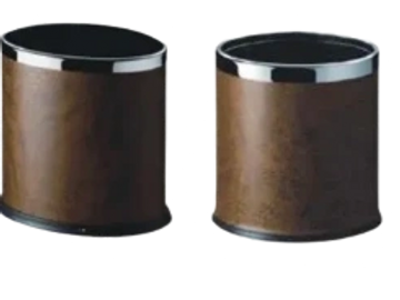 Two brown leather ottomans with black tops and bases.