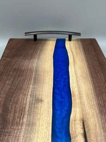 Walnut River board with blue pigment and handles