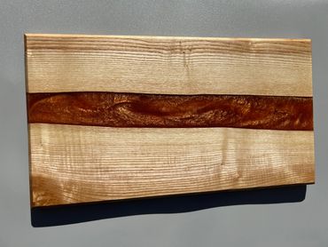 Ash wood epoxy resin river board with orange pigment