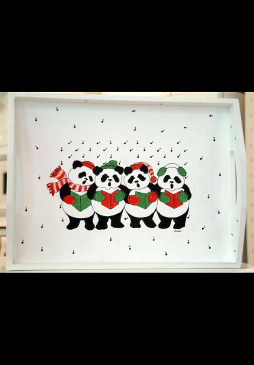 Four pandas wearing winter hats and scarves singing Christmas carols with musical notes around them.