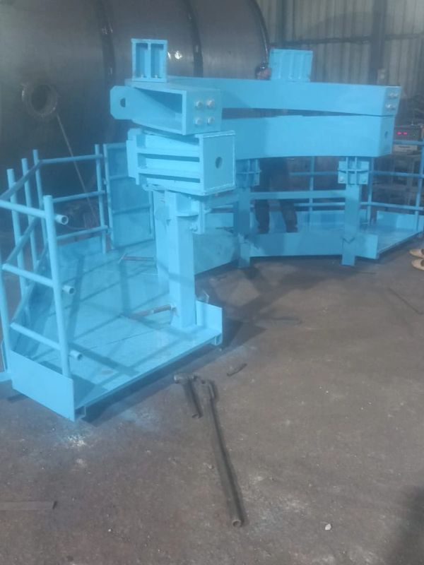 Blue industrial metal platform or machine frame indoors.
