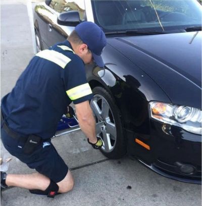 tire change service in Worcester MA by American Towing 