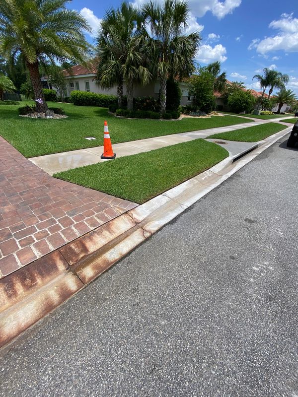 Rust and orange stain removal from concrete in Volusia County, FL. Safe, effective treatment.