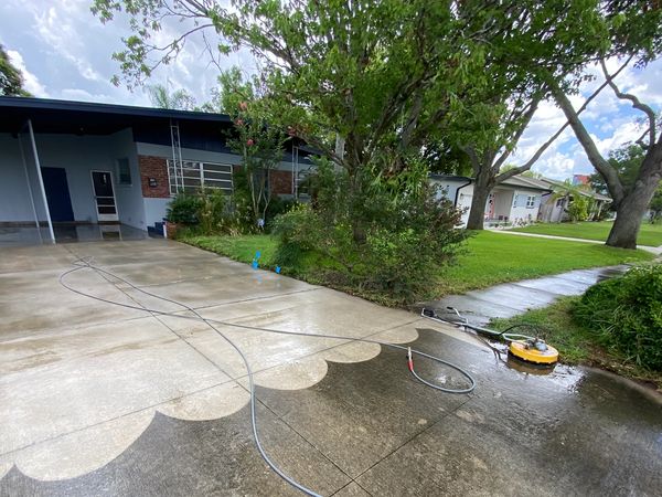 Professional driveway cleaning in Volusia County, FL. Remove dirt, algae, oil stains, and buildup.