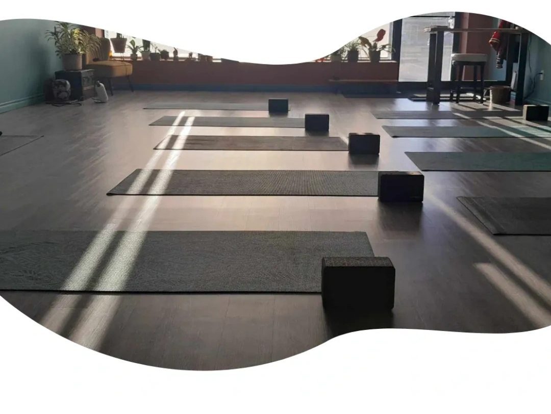 Inside the studio.  Yoga mats are out on the floor, all ready for class!