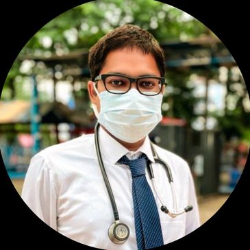 Young doctor wearing a mask and stethoscope outdoors.