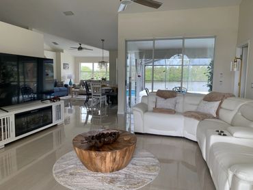 Looking at the formal living and TV, with an electrical fireplace, next
breakfast nook, family area.