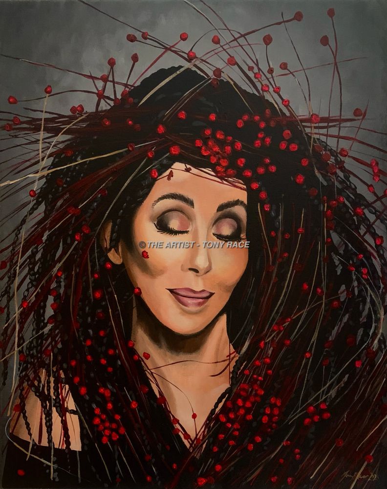 Portrait of a woman with closed eyes surrounded by red berries and dark hair.