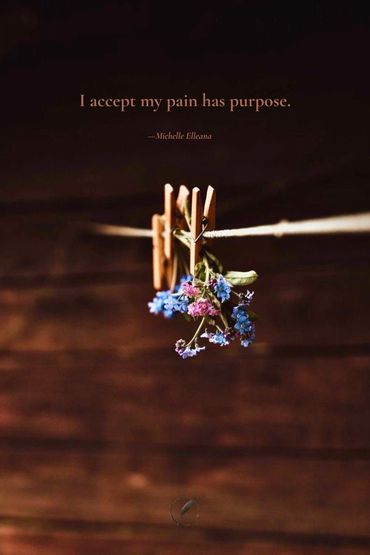 dried forget-me-not flowers hanging from a wooden clothespin — I accept my pain has purpose.