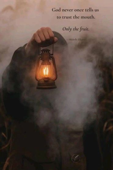 shrouded figure, glowing lantern, thick fog—discernment cutting through deception, faith reflection
