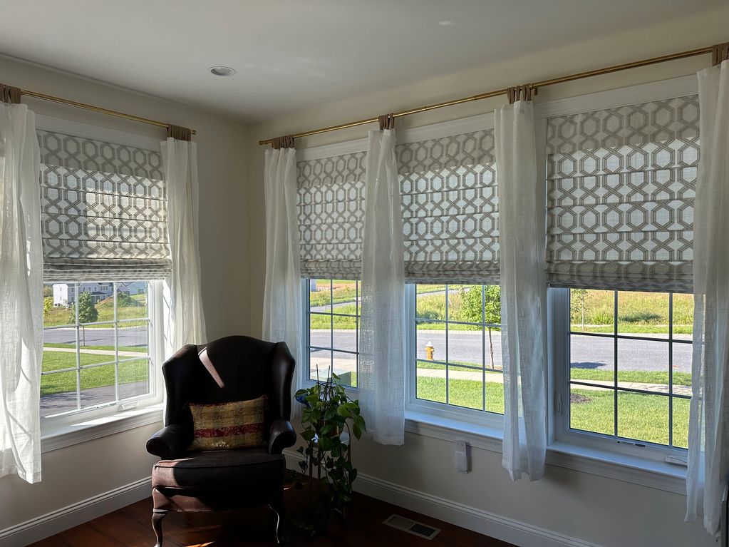 Cordless roman shades in office.