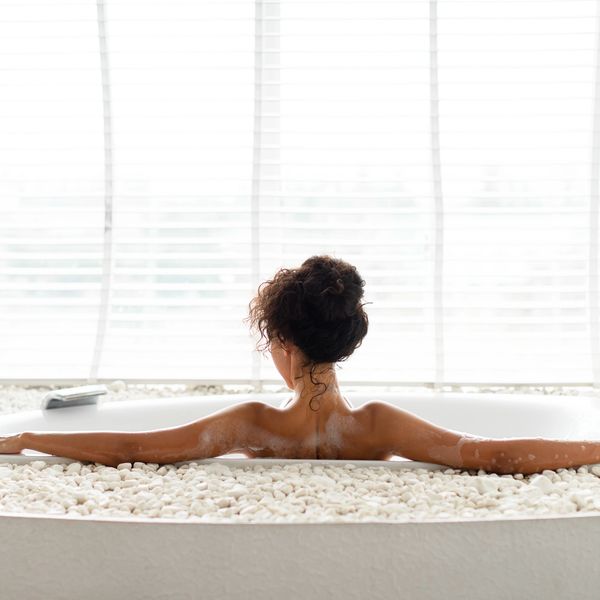 women soaking in a spa jet tub receiving relaxing hydrotherapy