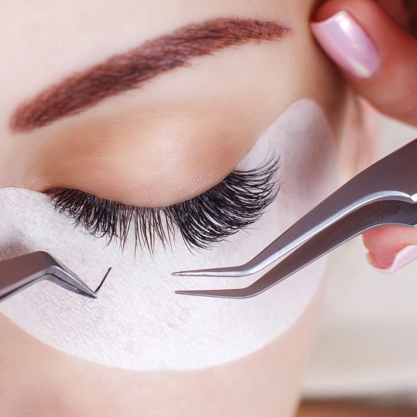 female having eyelashes applied 