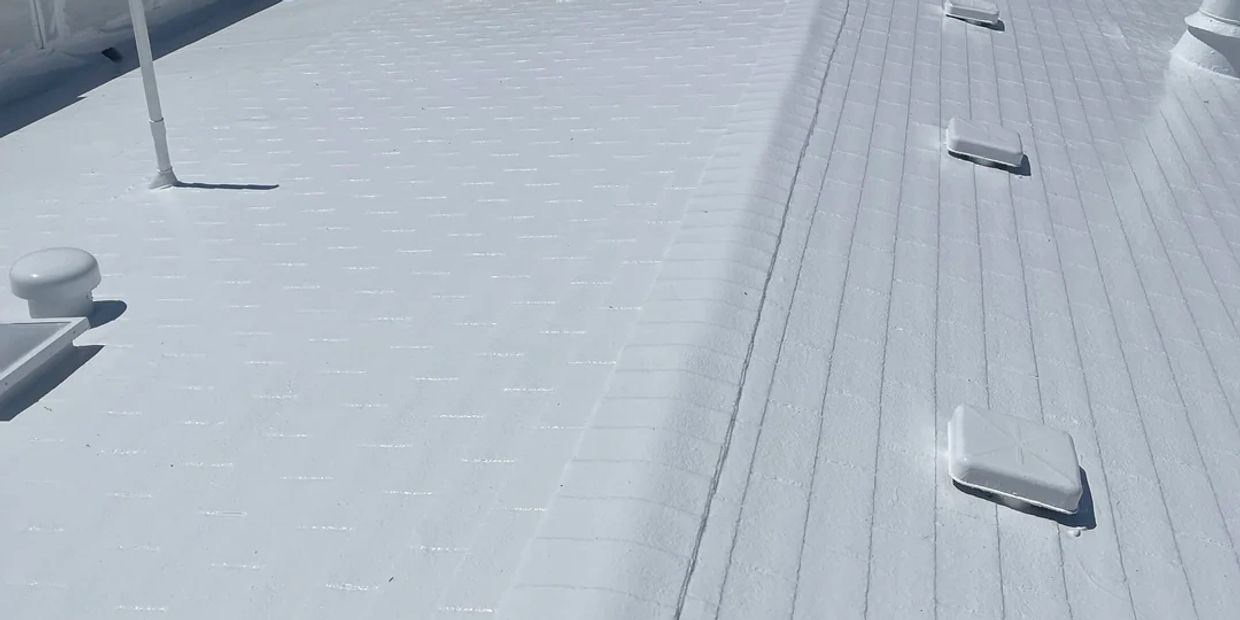 Silicone Roof Coating over asphalt shingles