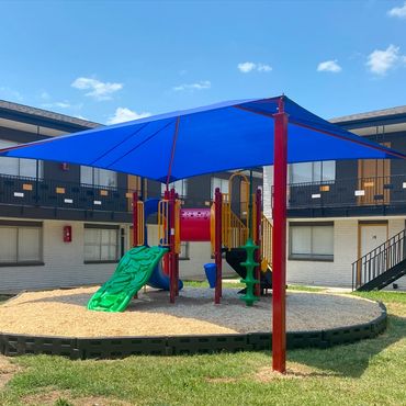 Outdoor living space, patio, exterior upgrade, amenity upgrade, playground, GC, general contractor 