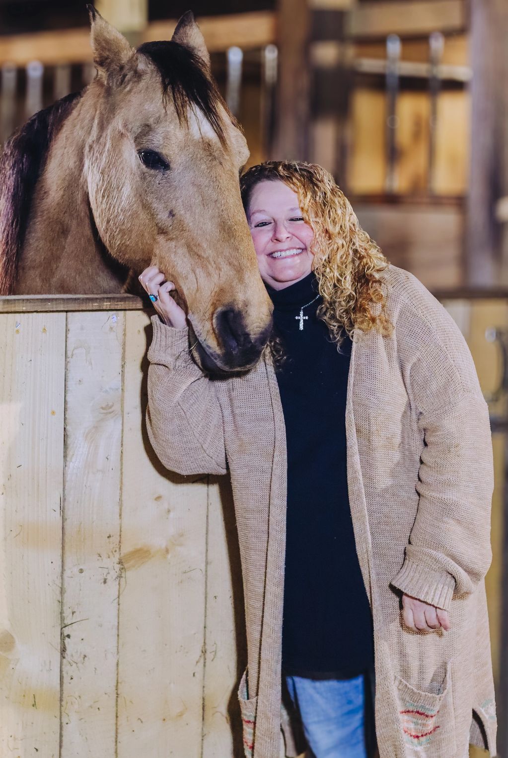 Kimberly Brisky, LMSW, with SonnyDaze Ranch program horse staff member Solomon