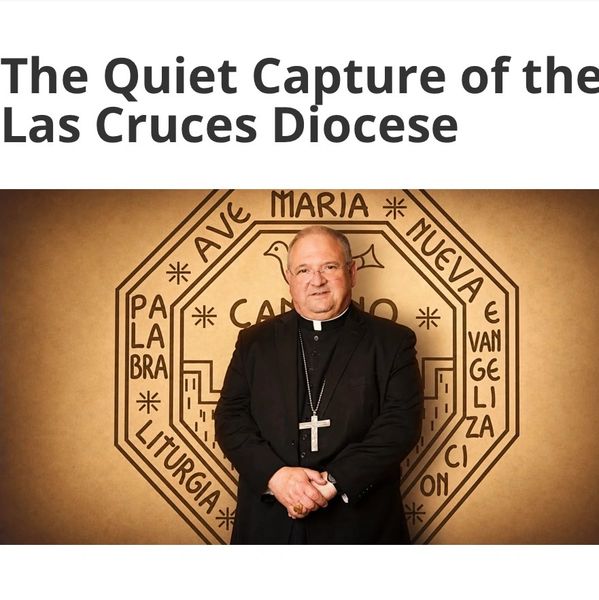 A Catholic bishop stands in front of a religious backdrop.