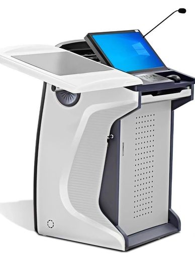 Modern podium with integrated computer and microphone for presentations.