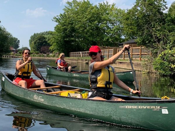 Women canoeing on the river 