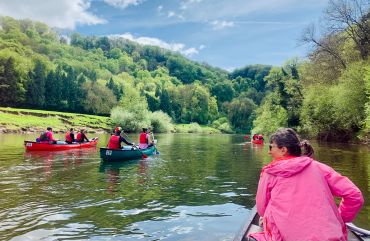 Women canoeing together in the wye valley 