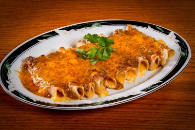 Chef Dustin's famous Cheese Enchiladas, part of the Tex-Mex menu at The Meadows