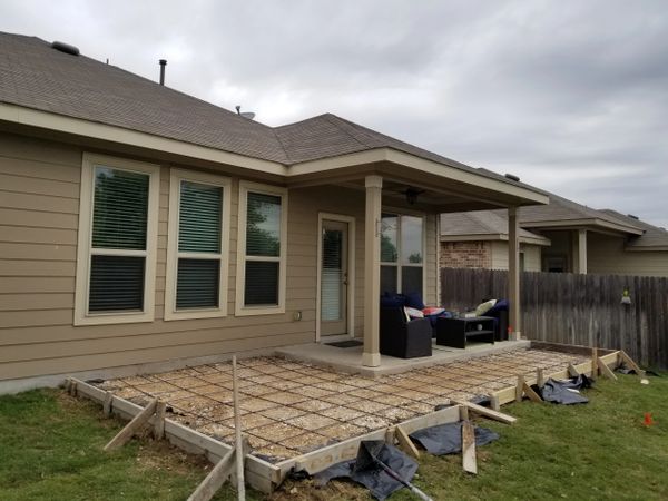 concrete patio extension formwork limestone base rebar installation