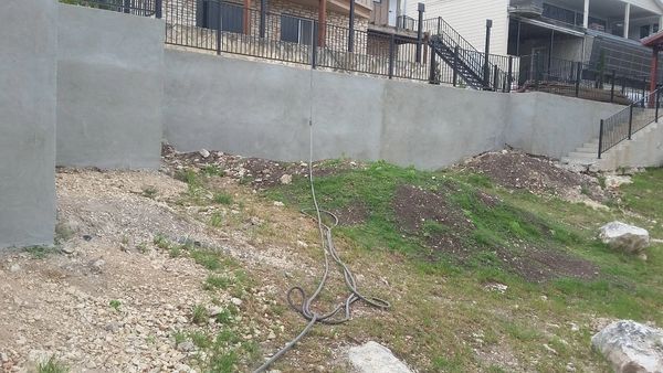 concrete retaining wall installation new braunfels texas