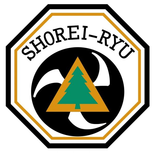 Logo of Shorei-Ryu martial arts style with tree and tri-blade design.