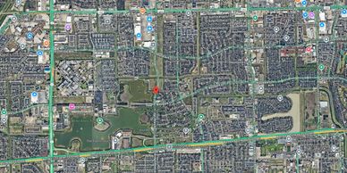 A detailed satellite map of a city area with labeled parks, roads, and businesses.