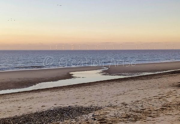 After glow skies creating stunning colours at Caister on Sea at Low tide. Norfolk coastal photos