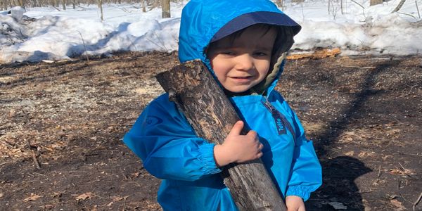 CLEGR FARMS- The "R" in CLEGR hauling  wood to the fire place in land-based learning program