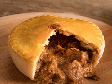 The Aussie pie is made with prime minced Beef and Onions seasoned with BBQ Sauce, Worcester sauce an