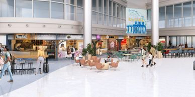 Spacious indoor food court with various eateries and seating areas.