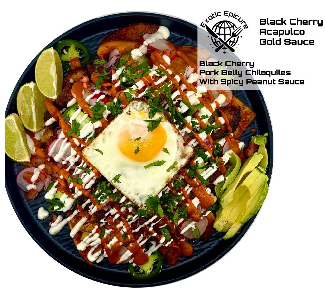 Black Cherry Pork Belly Chilaquiles topped with fried egg, avocado, and lime wedges.