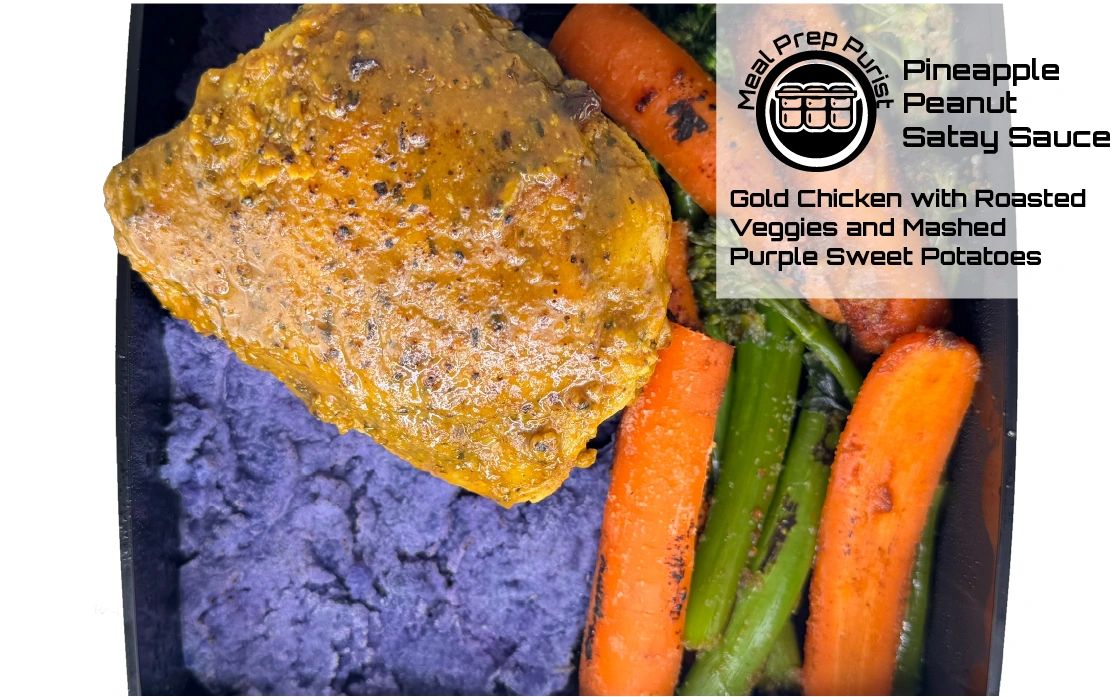 Gold chicken with pineapple peanut satay sauce, roasted veggies, and purple sweet potatoes.