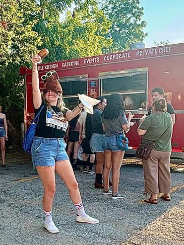 At Lucky Lou’s in Denton serving up hot dogs at glizzy fest featuring our macdaddy dog 