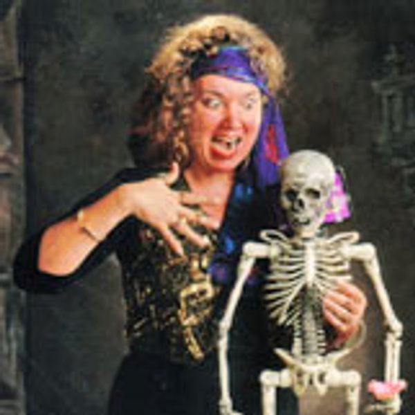 Dana Proulx-Willis performing comedy with skeleton