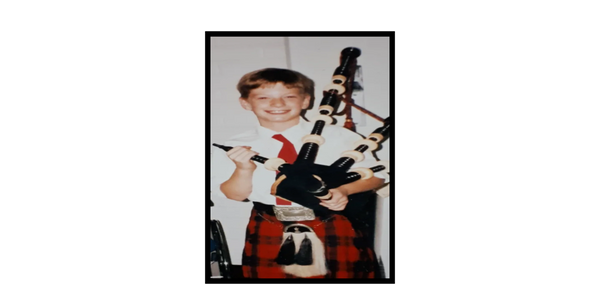 Young Kyle with Bagpipes