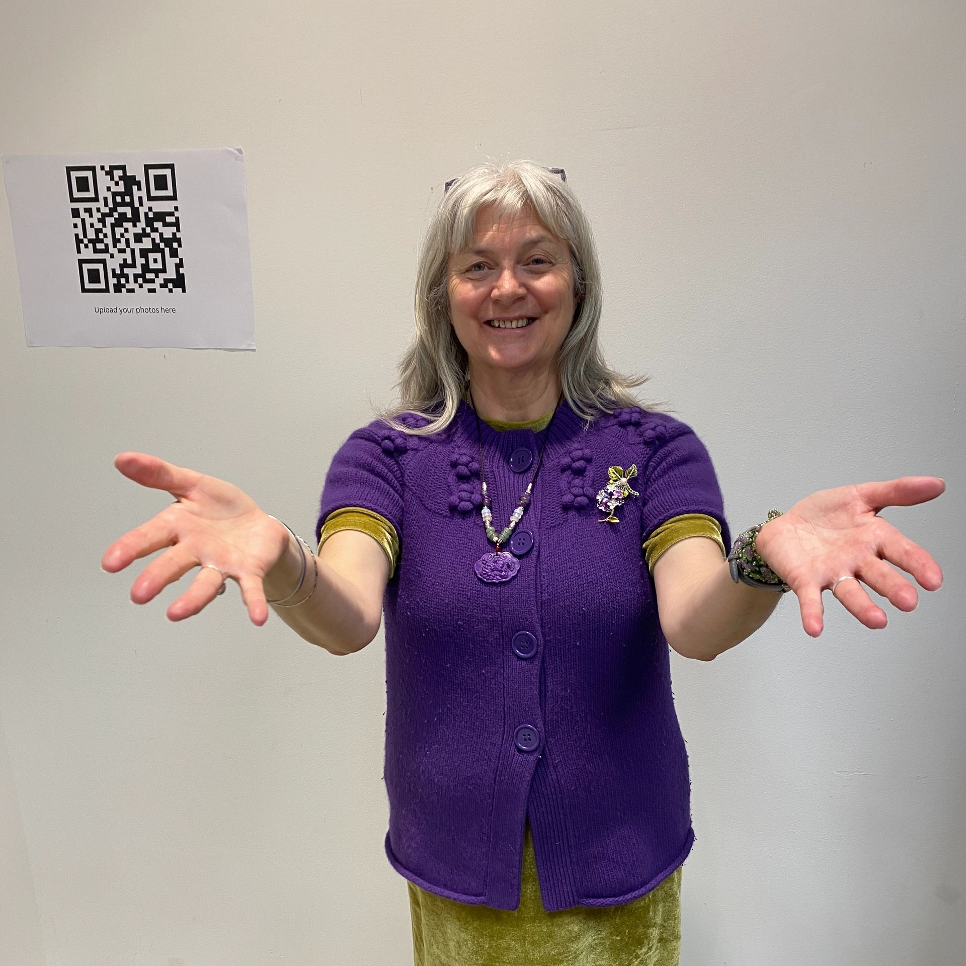 trainer with hands out stretched to camera