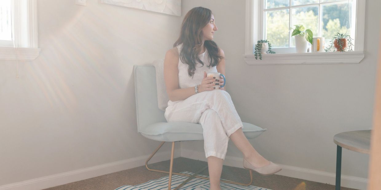 Jessi, founder of Westchester Counseling Studio sitting in therapy for adults in NY