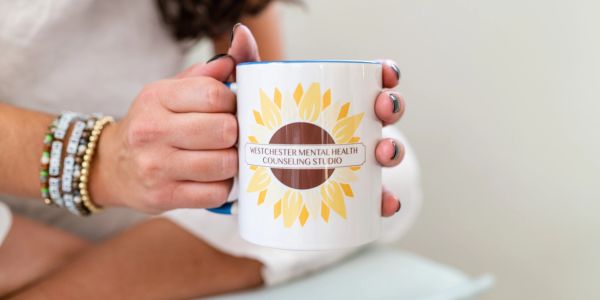 Mug with Westchester Counseling Studio sitting in therapy for adults in NY