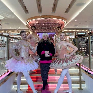 Dancers and Choreographer at the Covent Garden store entrance 
