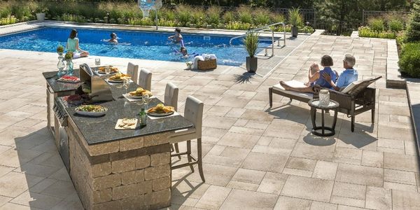 Patio Poolscapes With Outdoor Kitchen Islands