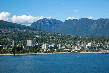 North Vancouver, British Columbia, Canada, Buildings with mountains in the background.