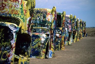 Amarillo, Texas, Cadillac Ranch, Row of old cars sticking up from the ground, graffiti painted.